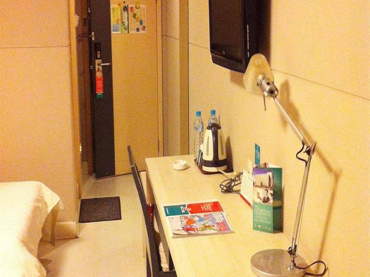فندق جينجيانج إن هايكو دونجفينجكياو المظهر الخارجي الصورة